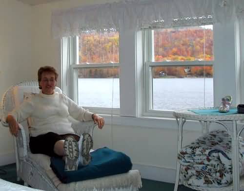 Martha relaxes in room overlooking Crystal Lake