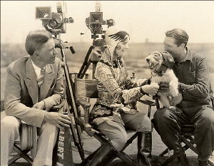 Lois Moran, Edmund Lowe, director Albert Ray, and Friend, on the set of "Publicity Madness," 1927
