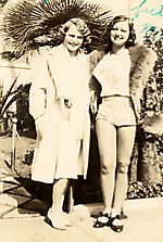 Lois Moran poses with a fan, ca. 1930, in the Era of lavish films and gorgeous film premiers
