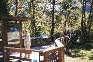 Rick checks out posted tourist info